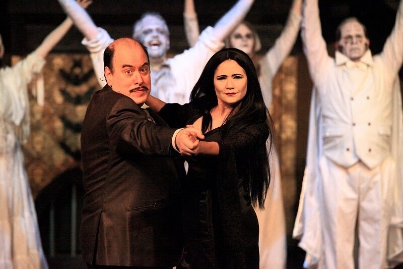 Gomez and Morticia dancing with Ancestors