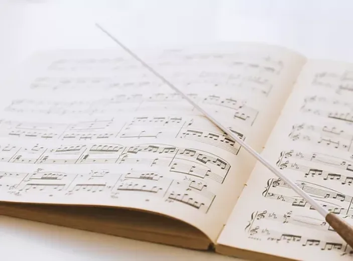 Conductors baton on sheet music